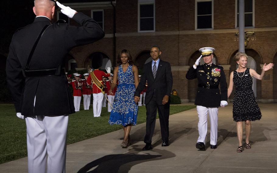 Obamas attend evening parade at Marine Barracks Washington Stars